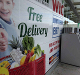 US to pay reduced food aid benefits,  but warns of weeks or months delay